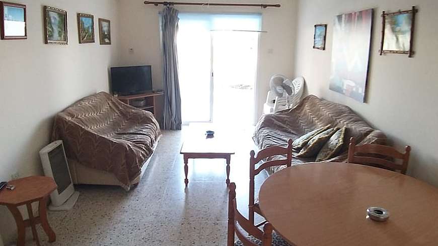 2 BEDROOM GROUND FLOOR APARTMENT IN PARALIMNI WITH LARGE YARD AND WITH TITLE DEEDS