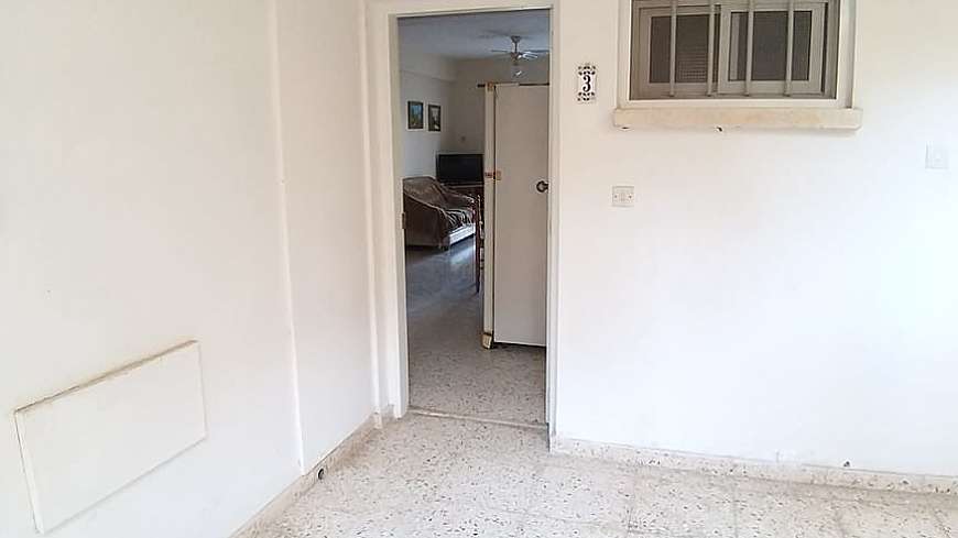 2 BEDROOM GROUND FLOOR APARTMENT IN PARALIMNI WITH LARGE YARD AND WITH TITLE DEEDS